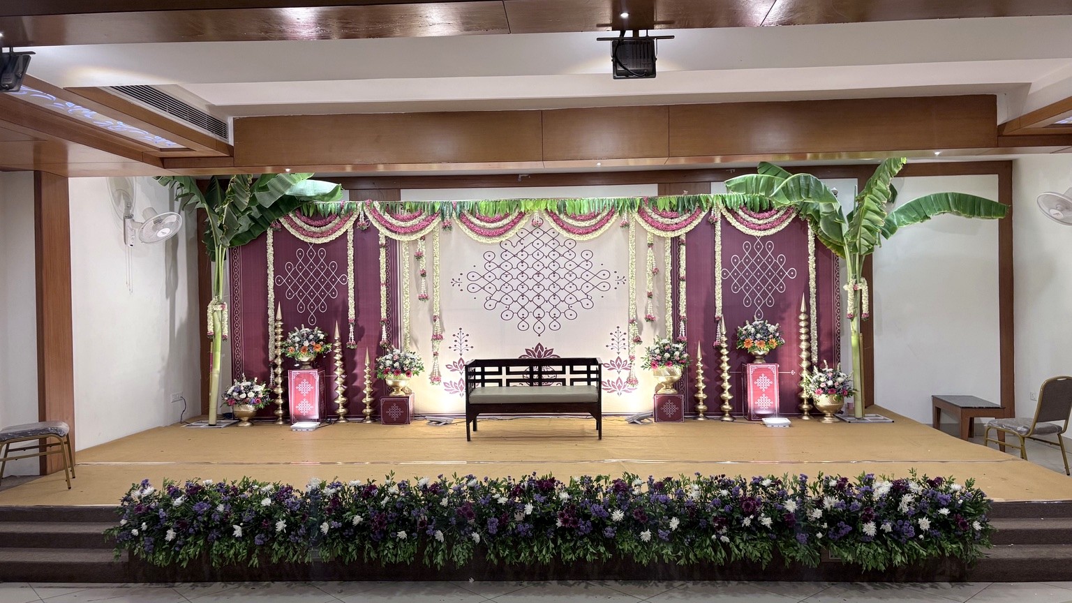 Purple floral engagement stage